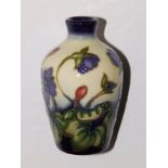 A boxed Moorcroft Hepatica pattern vase by Emma Bossons - 1999,  3.7”