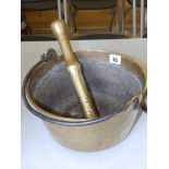 A small brass jam pan and a pestle (2)