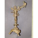 An Indian brass figural stand, 11”