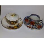 A Royal Worcester cup & saucer painted roses together with a Derby Japan pattern tea cannister &