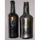 An early 19thC sealed wine bottle by Ricketts of Bristol, bearing griffin crest above 'GS' and one