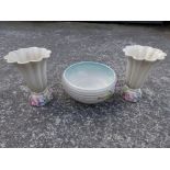 A Clarice Cliff Newport Pottery three piece bowl & vase garniture relief moulded in coloured flowers