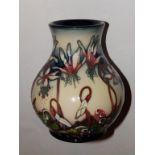 A boxed Moorcroft Minuet pattern vase by Nicola Slaney – 2004,  6”