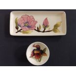 A white ground Moorcroft magnolia pattern white ground rectangular tray – 1991, 8” and a small