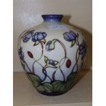 A Moorcroft Hepatica pattern vase by Emma Bossons – 1999, 7” - slight crazing to glaze