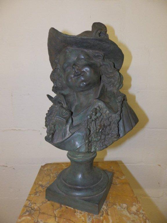 A bronze bust of a young woman in 18thC style costume, 18.5”