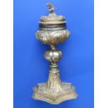 A 17thC gilt copper ciborium, the dtetachable cover with dove finial, the knopped stem to hexafoil