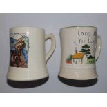 A Plichta mug – 'A Killing Fly' and a Bovey Pottery mug (2)