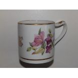 A 19thC floral decorated porcelain mug