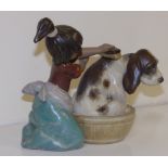 A Lladro figure group – Girl scrubbing dog, 2273