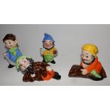 Four Weatherby pottery gnomes