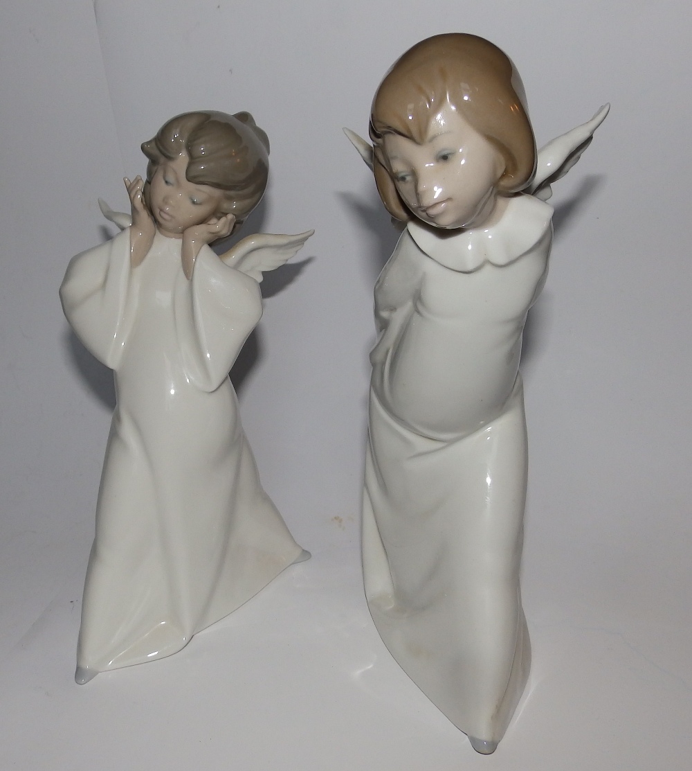 A pair of Lladro angels