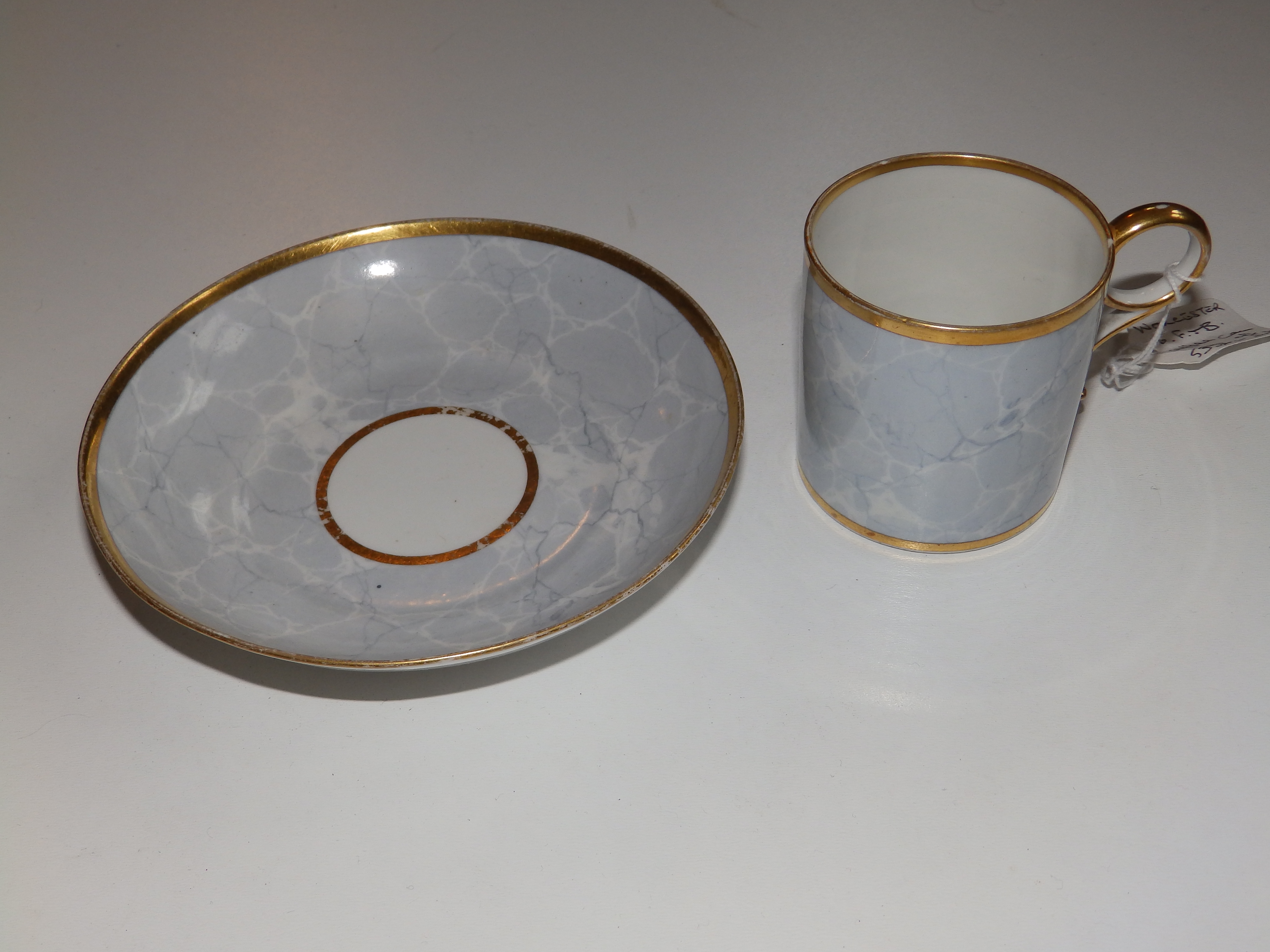 A Barr Flight & Barr Worcester coffee can & saucer with grey marbling and gilding – impressed marks