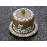 A brown jasperware stilton dome & stand