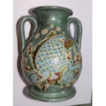 A two-handled vase decorated fish, 9.75” high