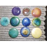 10 Ruskin circular cabochon plaques – approximately 1.25”