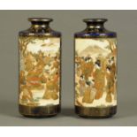 A pair of Japanese Satsuma vases, decorated with Mount Fuji, male and female figures, heightened