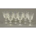 Six crystal sherry glasses, each with kn