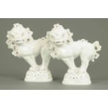 A pair of Chinese porcelain Fo dogs.  He