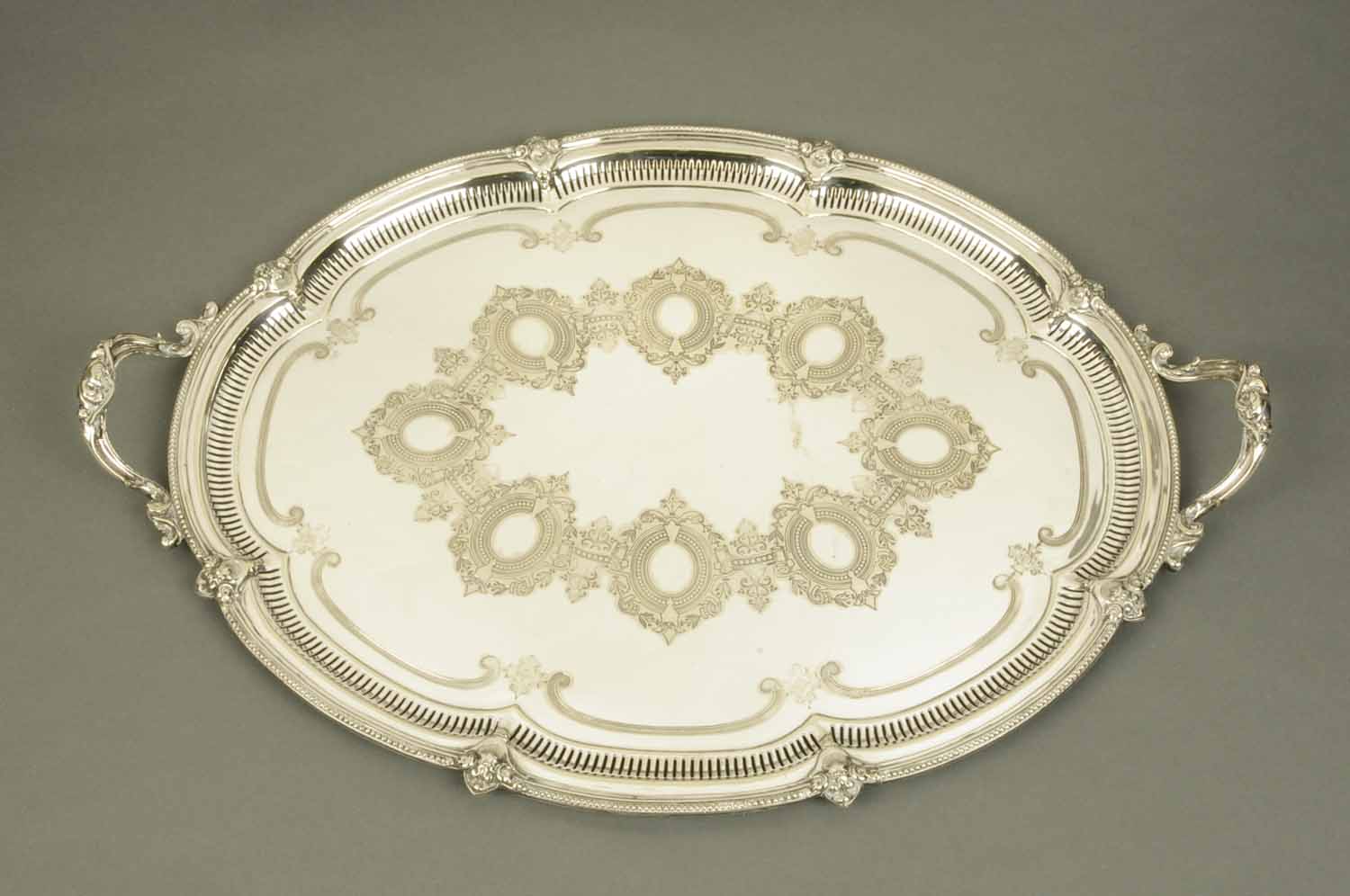 A Victorian silver plated tray, of shape
