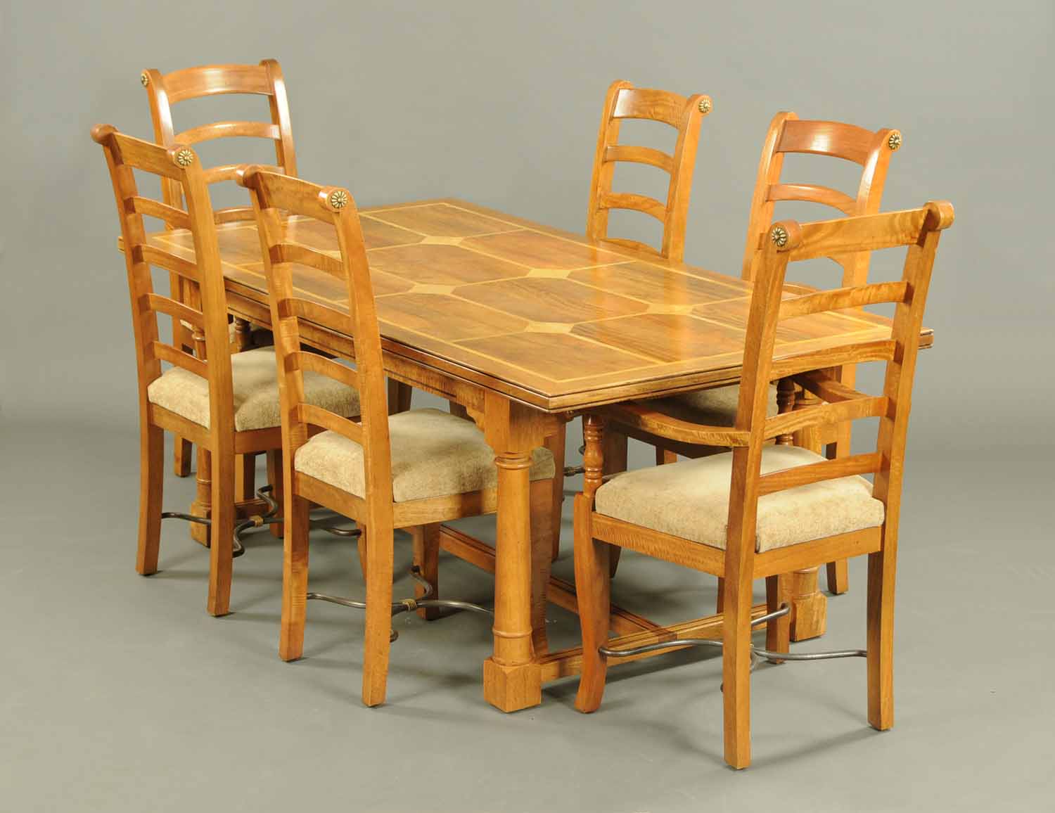 A Barker & Stonehouse Flagstone Range dining table and six chairs, the table with parquetry top,