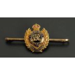 A 9 ct gold Royal Engineers pin, enamelled, cased, 5.3 grams.