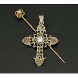 A silver coloured metal cross, marcasite and with paste stone and an opal set stick pin.