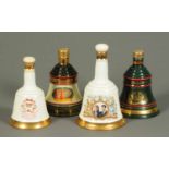 Four Wade porcelain Bells Whisky decanters, unopened, Christmas 1991, 1994,