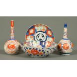 Four pieces of 19th century Imari, pair of club shaped vases, shaped bowl and plate.