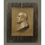 Rhys Raworth, bronze bas-relief portrait plaque of a gentleman.  11 ins x 9 ins (see illustration).