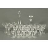 A crystal ships decanter, with ground pontil mark, a club shaped decanter and a part suite of