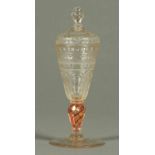 A late 18th century Continental glass vase or goblet with cover, faceted and with red and gold twist