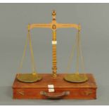 A Westmorland County Council 7lb beam scale, cased.