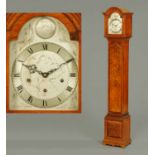 A walnut grandmother clock, with three-train spring driven movement striking on four gongs.