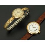 A ladies 9 ct gold cased wristwatch, with enamelled dial and Roman numerals,