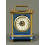 An Edwardian carriage clock, with blue glass panels and face, Arabic numerals, timepiece only.