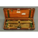 A County of Westmorland 56 lb beam scale, cased, by De Grave & Co.