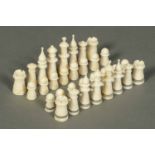 A bone chess set, circa 1900.   Height of king 2 ins.