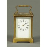 A brass carriage clock, French, timepiece only.