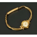 A ladies 9 ct gold cased wristwatch, by Avalon, with 9 ct gold bracelet, gross weight 15.