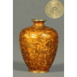 A small Japanese enamelled vase, orange, bearing character marks to base.  Height 4 ins.