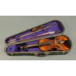 A Hopf Hahn violin, cased and with two bows. CONDITION REPORT: The violin is a little tatty but does