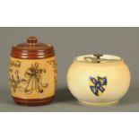 A Carltonware tobacco jar, with crest, and a Doulton Lambeth lidded tobacco jar.