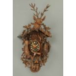 A massive Black Forest cuckoo clock, wall mounting, playing four tunes, one on the hour and one of