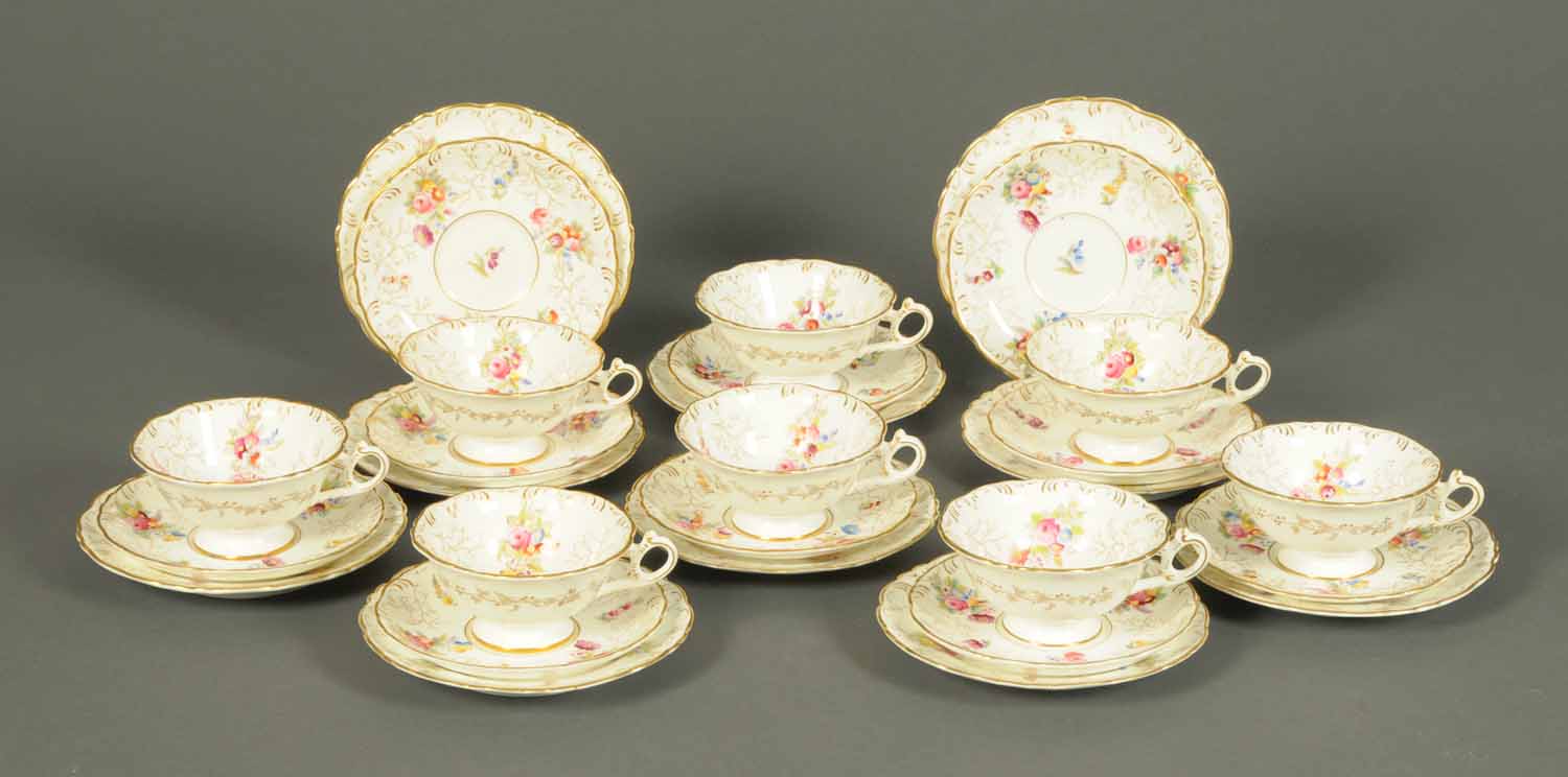 A Coalport tea set, comprising eight cups, ten saucers, ten plates, each decorated with floral