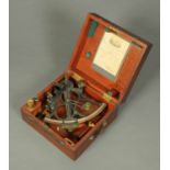 A Wilson & Gillie of North Shields sextant, circa 1900, with additional lenses and mahogany case,