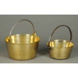 Two Victorian brass jam pans, one with fixed handle, diameter 9 ins, the other diameter 12 ins.