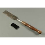 A large Victorian chisel, by Buck Brothers, cast steel.  Length 29 ins.