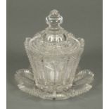 A heavy cut glass lidded vase on seven sided stand.  Height 8.25 ins (see illustration).