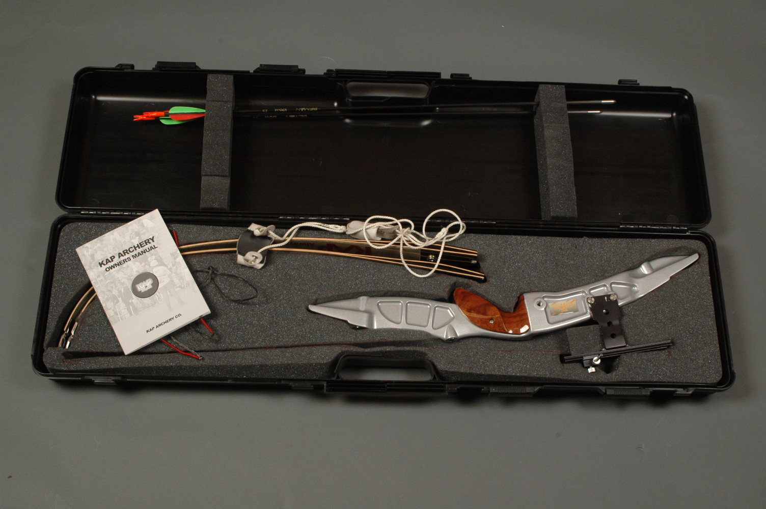 KAP Evolution 2 recurve bow, right handed, cased, quiver with 8 arrows and tube of 8 arrows.